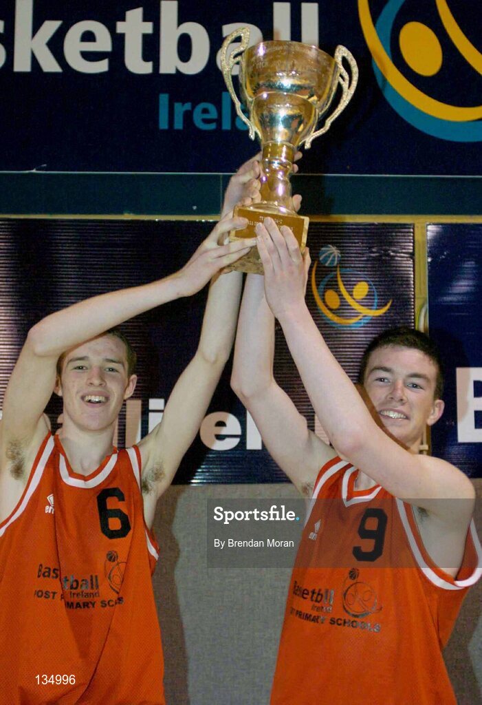 24 March 2004; St Fintan's co-captains Darren O'Moore, left, and Michael Chubb lift the cup after the game. All-Ireland Schoolboys Basketball League, U16 'A'  Final, St Joseph's Patrician College, Galway v St Fintan's, Sutton, Dublin, ESB Arena, Tallaght, Dublin. Picture credit; Brendan Moran / SPORTSFILE *EDI*