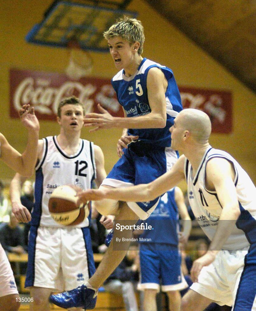 24 March 2004; Ronan Hartnett, Mercy Mounthawk, in action against Ciaran O'Donoghue (12) and Mark Moore, Malahide. All-Ireland Schoolboys Basketball League, U19 'B'  Final, Malahide Community School, Dublin v Mercy Mounthawk, Tralee, Co. Kerry, ESB Arena, Tallaght, Dublin. Picture credit; Brendan Moran / SPORTSFILE *EDI*