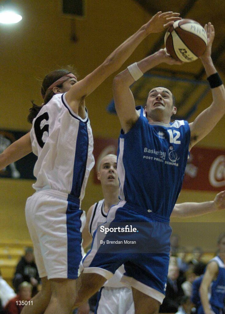 24 March 2004; John Dowling (12) Mercy Mounthawk, in action against Juan Pablo Flores, Malahide. All-Ireland Schoolboys Basketball League, U19 'B'  Final, Malahide Community School, Dublin v Mercy Mounthawk, Tralee, Co. Kerry, ESB Arena, Tallaght, Dublin. Picture credit; Brendan Moran / SPORTSFILE *EDI*