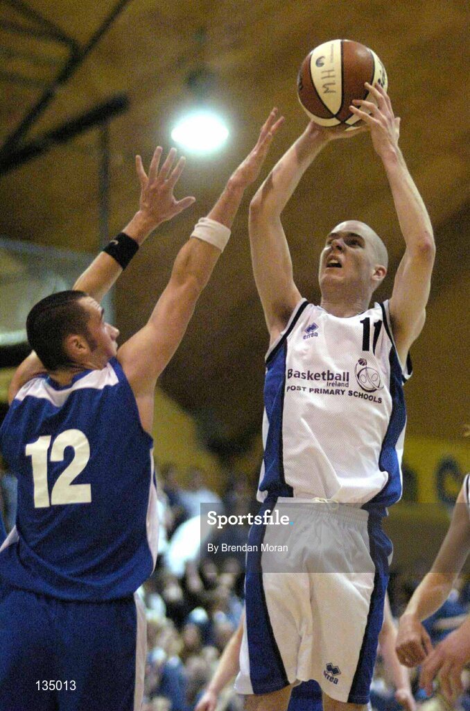 24 March 2004; Mark Moore, Malahide, in action against John Dowling, Mercy Mounthawk. All-Ireland Schoolboys Basketball League, U19 'B'  Final, Malahide Community School, Dublin v Mercy Mounthawk, Tralee, Co. Kerry, ESB Arena, Tallaght, Dublin. Picture credit; Brendan Moran / SPORTSFILE *EDI*