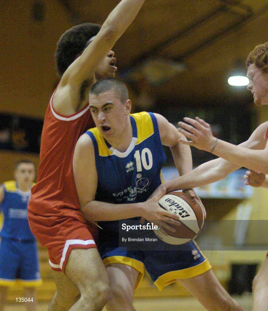 24 March 2004; Daniel O'Mahony, North Mon, in action against Aaron Westbrooks and Shane O'Moore, right, St Fintan's. All-Ireland Schoolboys Basketball League, U19 'A'  Final, St Fintan's, Sutton, Dublin v North Monastery, Cork, ESB Arena, Tallaght, Dublin. Picture credit; Brendan Moran / SPORTSFILE *EDI*