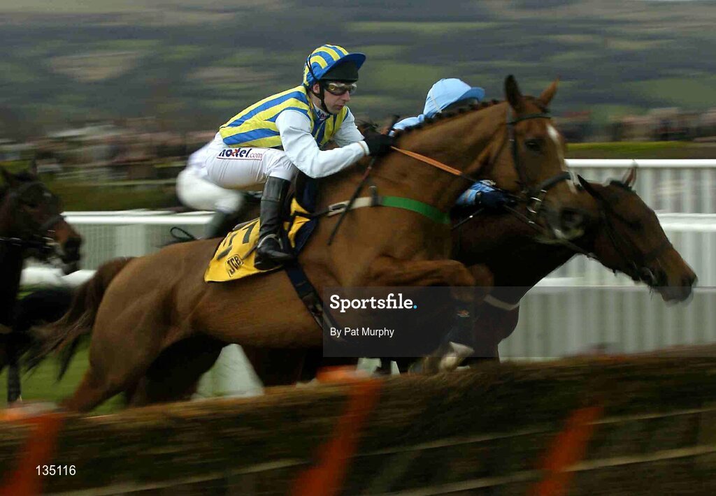 18 March 2004; Tusk, with Jim Culloty up, jumps the last first time around during the JCB Triumph Hurdle Race, Cheltenham Festival, Prestbury Park, Cheltenham, England. Horse Racing. Picture credit; Pat Murphy / SPORTSFILE *EDI*