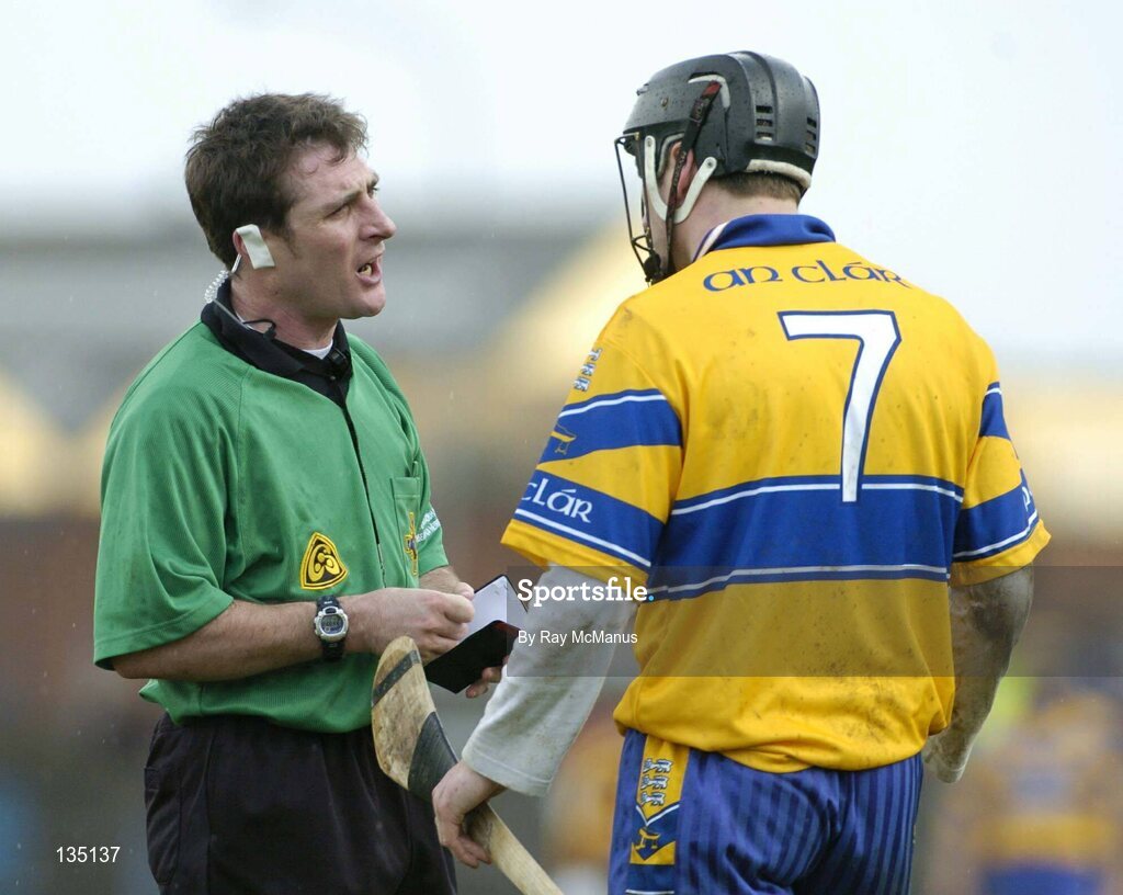 21 March 2004; Referee Declan Roche speaks to Clare's Gerry Quinn. Allianz Hurling League 2004, Division 1A, Round 4, Clare v Kilkenny, Cusack Park, Ennis, Co. Clare. Picture credit; Ray McManus / SPORTSFILE *EDI*