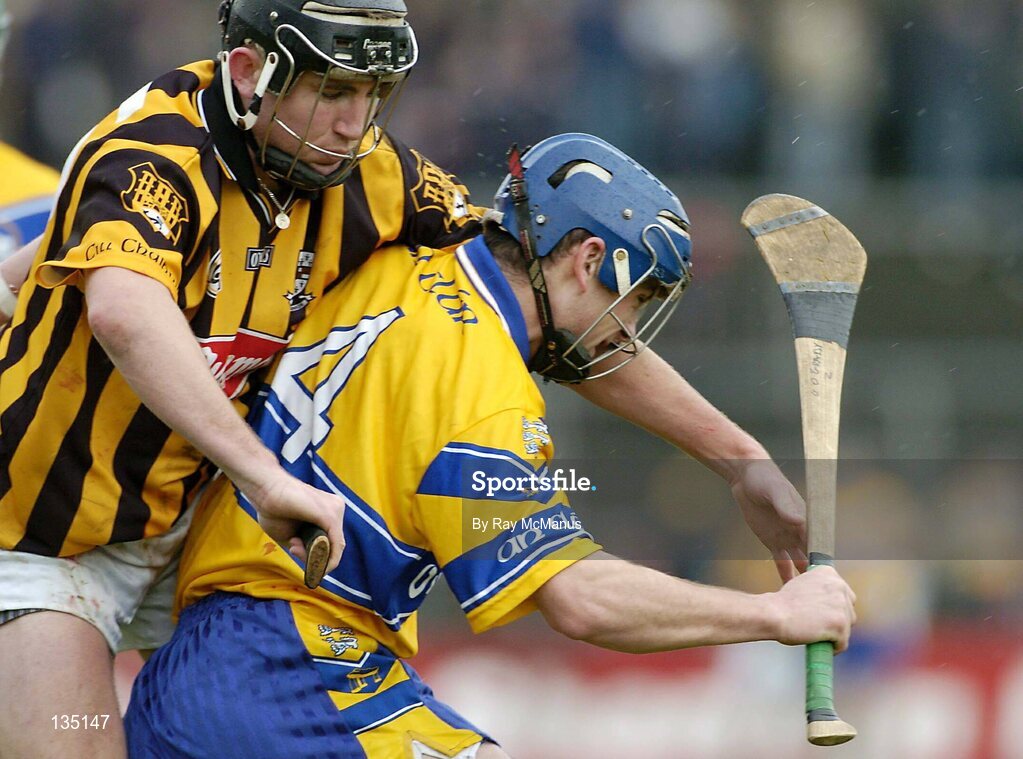 21 March 2004; Gerry O'Grady, Clare, in action against Eddie Brennan, Kilkenny. Allianz Hurling League 2004, Division 1A, Round 4, Clare v Kilkenny, Cusack Park, Ennis, Co. Clare. Picture credit; Ray McManus / SPORTSFILE *EDI*
