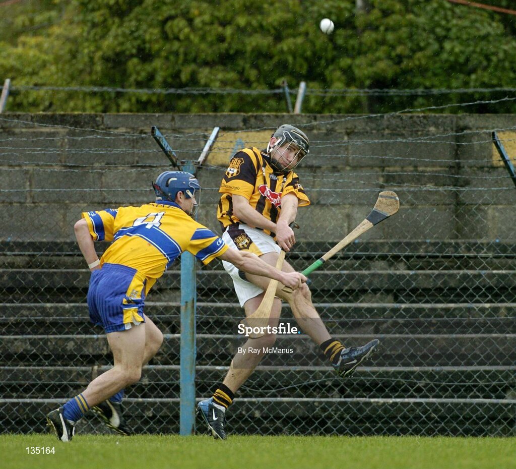 21 March 2004; Eddie Brennan, Kilkenny, in action against Gerry O'Grady, Clare. Allianz Hurling League 2004, Division 1A, Round 4, Clare v Kilkenny, Cusack Park, Ennis, Co. Clare. Picture credit; Ray McManus / SPORTSFILE *EDI*
