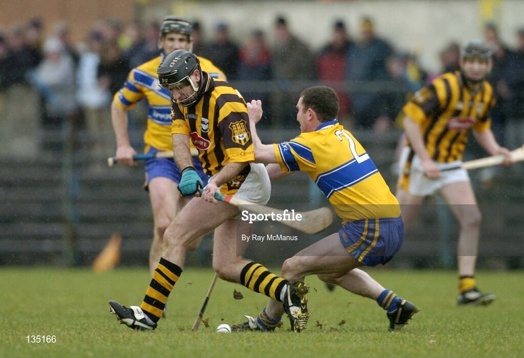 21 March 2004; DJ Carey, Kilkenny, in action against Brian Quinn, Clare. Allianz Hurling League 2004, Division 1A, Round 4, Clare v Kilkenny, Cusack Park, Ennis, Co. Clare. Picture credit; Ray McManus / SPORTSFILE *EDI*