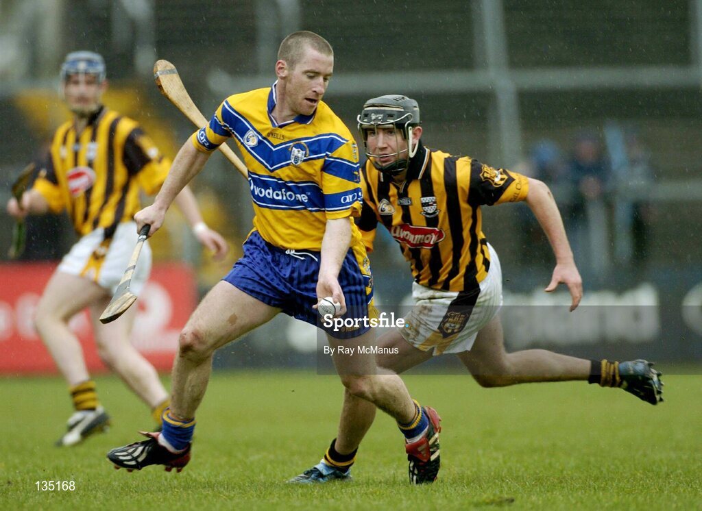 21 March 2004; David Hoey, Clare, in action against Eddie Brennan, Kilkenny. Allianz Hurling League 2004, Division 1A, Round 4, Clare v Kilkenny, Cusack Park, Ennis, Co. Clare. Picture credit; Ray McManus / SPORTSFILE *EDI*