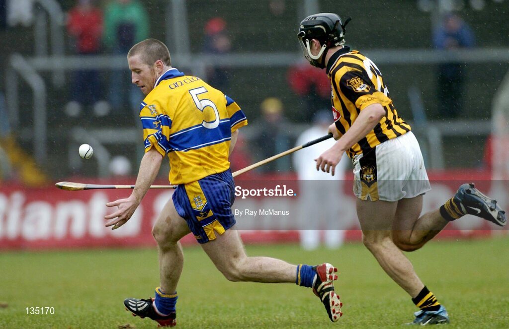 21 March 2004; David Hoey, Clare, in action against Eddie Brennan, Kilkenny. Allianz Hurling League 2004, Division 1A, Round 4, Clare v Kilkenny, Cusack Park, Ennis, Co. Clare. Picture credit; Ray McManus / SPORTSFILE *EDI*
