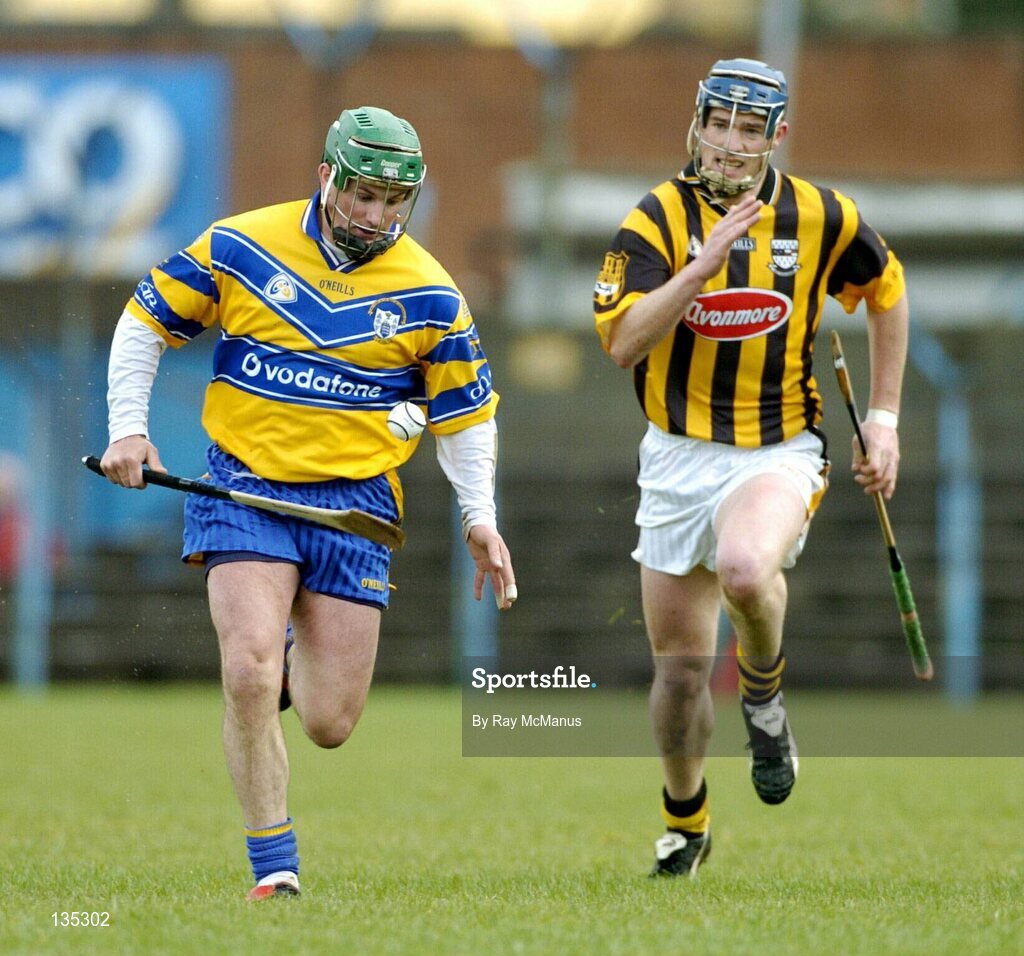 21 March 2004; Alan Markham, Clare, in action against Sean Dowling, Kilkenny. Allianz Hurling League 2004, Division 1A, Round 4, Clare v Kilkenny, Cusack Park, Ennis, Co. Clare. Picture credit; Ray McManus / SPORTSFILE *EDI*