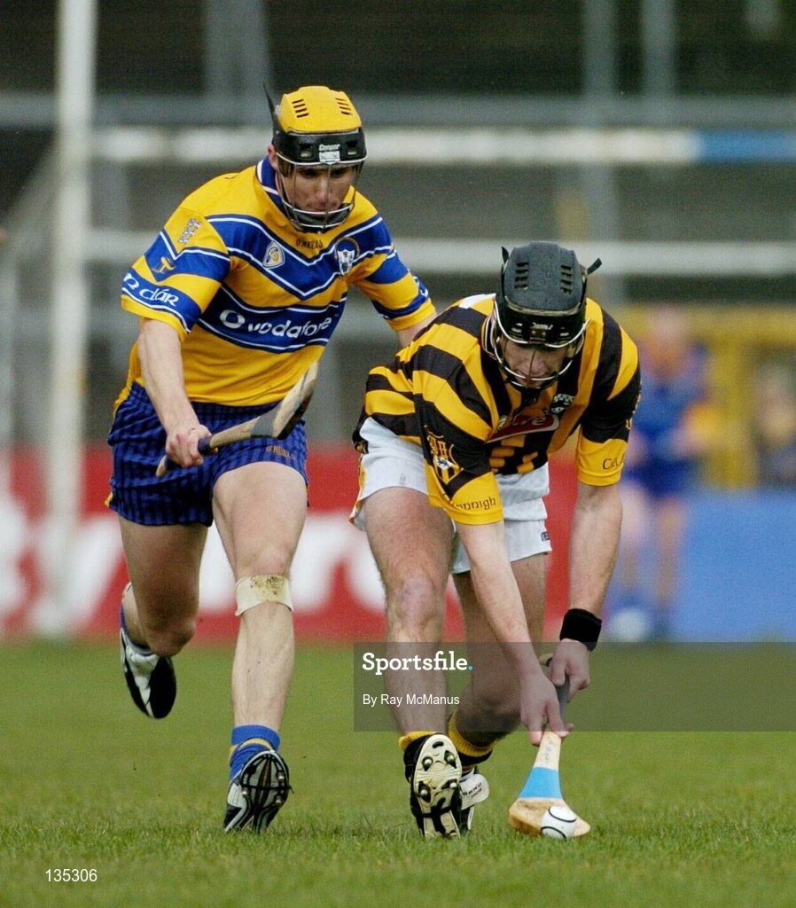 21 March 2004; JJ Delaney, Kilkenny, in action against Tony Griffin, Clare. Allianz Hurling League 2004, Division 1A, Round 4, Clare v Kilkenny, Cusack Park, Ennis, Co. Clare. Picture credit; Ray McManus / SPORTSFILE *EDI*