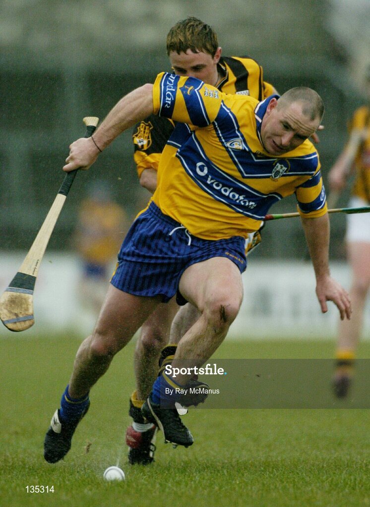 21 March 2004; Colin Lynch, Clare, in action against Mark Phelan, Kilkenny. Allianz Hurling League 2004, Division 1A, Round 4, Clare v Kilkenny, Cusack Park, Ennis, Co. Clare. Picture credit; Ray McManus / SPORTSFILE *EDI*