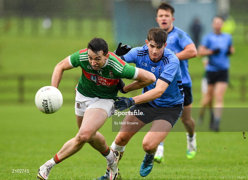23 October 2021; Evan Regan of Ballina Stephenites in action against Rory Brickenden of Westport St Patrick's during the Mayo County Senior Club Football Championship Quarter-Final match between Westport St Patrick's and Ballina Stephenites at Connacht GAA Centre in Bekan, Mayo. Photo by Matt Browne/Sportsfile