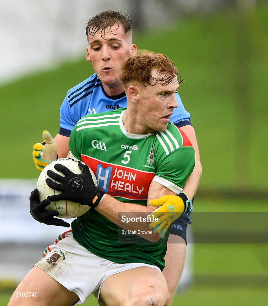 23 October 2021; Sean Regan of Ballina Stephenites in action against Eoghan McLaughlin of Westport St Patrick's during the Mayo County Senior Club Football Championship Quarter-Final match between Westport St Patrick's and Ballina Stephenites at Connacht GAA Centre in Bekan, Mayo. Photo by Matt Browne/Sportsfile