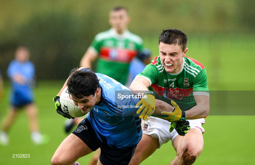 23 October 2021; Colm Moran of Westport St Patrick's in action against Ciaran Boland of Ballina Stephenites during the Mayo County Senior Club Football Championship Quarter-Final match between Westport St Patrick's and Ballina Stephenites at Connacht GAA Centre in Bekan, Mayo. Photo by Matt Browne/Sportsfile