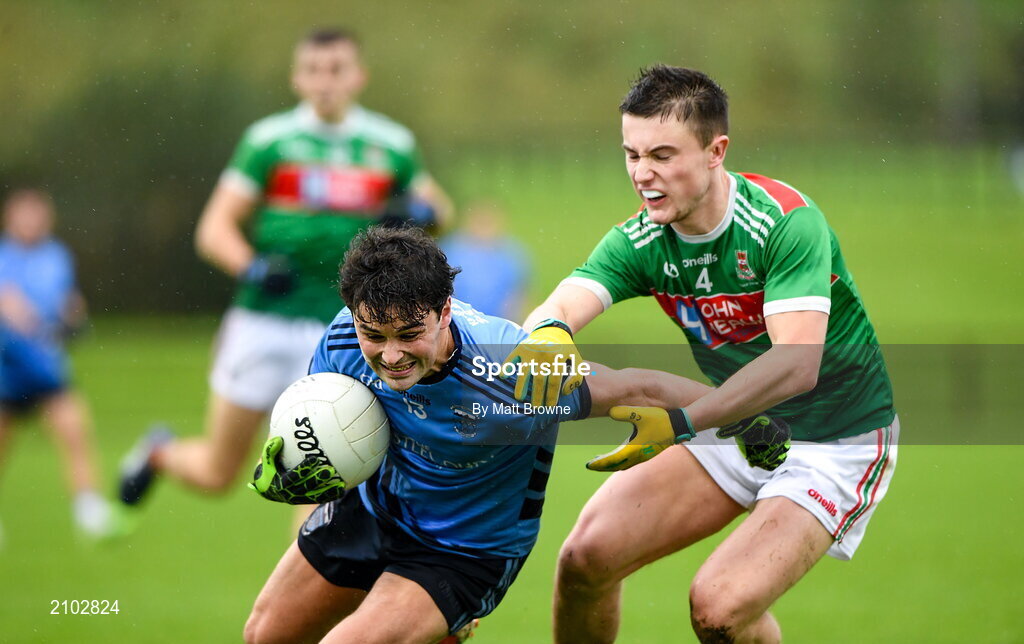 23 October 2021; Colm Moran of Westport St Patrick's in action against Ciaran Boland of Ballina Stephenites during the Mayo County Senior Club Football Championship Quarter-Final match between Westport St Patrick's and Ballina Stephenites at Connacht GAA Centre in Bekan, Mayo. Photo by Matt Browne/Sportsfile