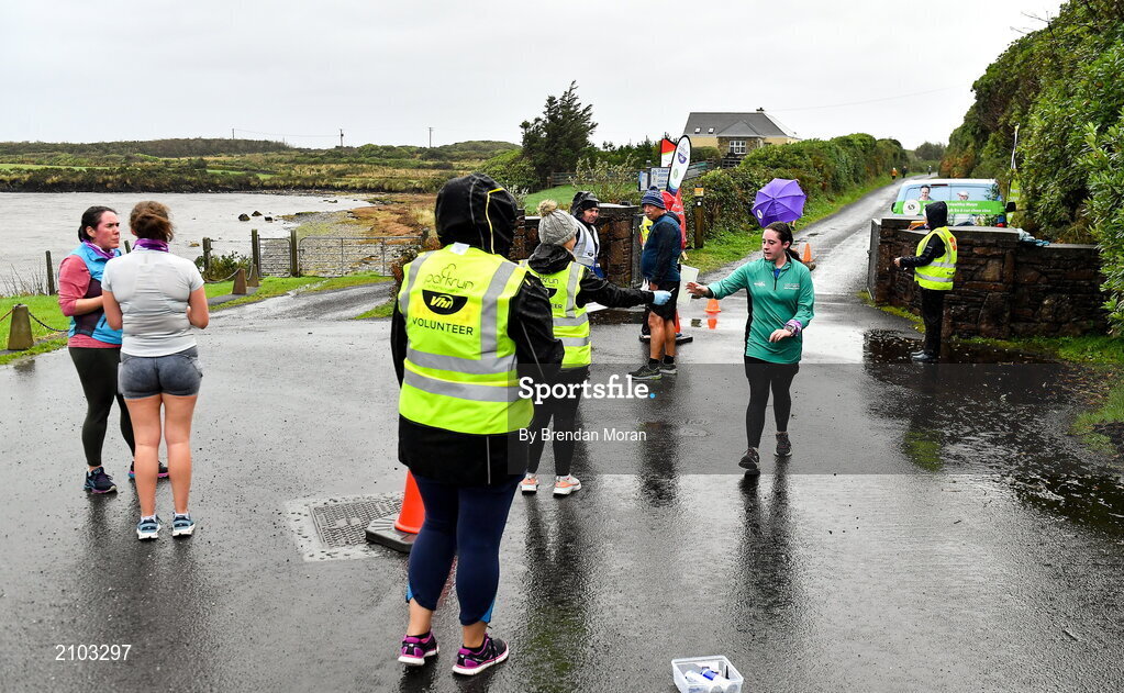23 October 2021; Parkrun Ireland in partnership with Vhi, added a new parkrun at Achill Greenway on Saturday, 23rd of October, with the introduction of the Achill Greenway parkrun at Achill Greenway, Great Western Greenway in Achill, Mayo. Parkruns take place over a 5km course weekly, are free to enter and are open to all ages and abilities, providing a fun and safe environment to enjoy exercise. To register for a parkrun near you visit www.parkrun.ie. Pictured at the parkrun are volunteers at the finish line. Photo by Brendan Moran/Sportsfile