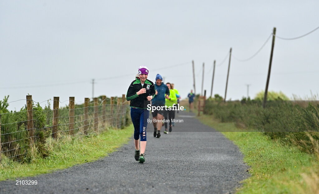 23 October 2021; Parkrun Ireland in partnership with Vhi, added a new parkrun at Achill Greenway on Saturday, 23rd of October, with the introduction of the Achill Greenway parkrun at Achill Greenway, Great Western Greenway in Achill, Mayo. Parkruns take place over a 5km course weekly, are free to enter and are open to all ages and abilities, providing a fun and safe environment to enjoy exercise. To register for a parkrun near you visit www.parkrun.ie. Pictured is a participant during the parkrun. Photo by Brendan Moran/Sportsfile