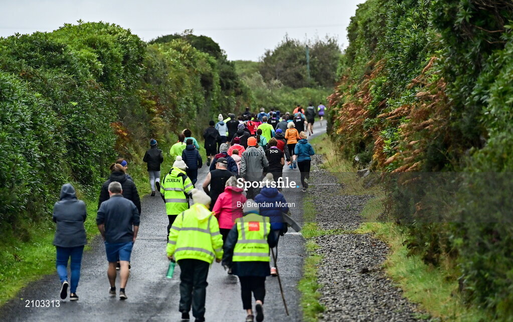 23 October 2021; Parkrun Ireland in partnership with Vhi, added a new parkrun at Achill Greenway on Saturday, 23rd of October, with the introduction of the Achill Greenway parkrun at Achill Greenway, Great Western Greenway in Achill, Mayo. Parkruns take place over a 5km course weekly, are free to enter and are open to all ages and abilities, providing a fun and safe environment to enjoy exercise. To register for a parkrun near you visit www.parkrun.ie. Pictured are participants at the start of the parkrun. Photo by Brendan Moran/Sportsfile