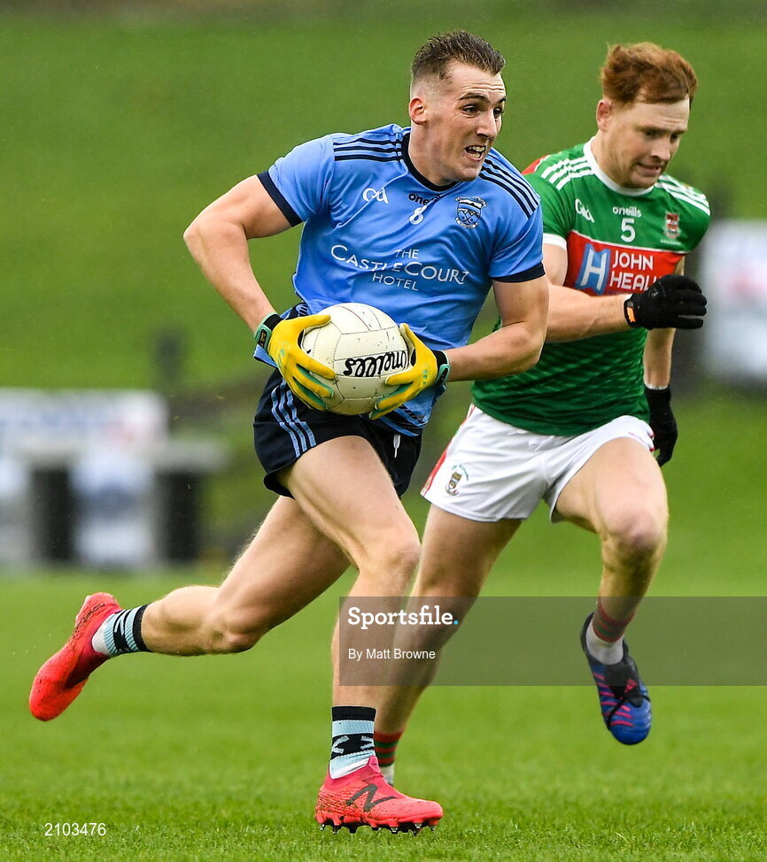 23 October 2021; Eoghan McLaughlin of Westport St Patrick's in action against Sean Regan of Ballina Stephenites during the Mayo County Senior Club Football Championship Quarter-Final match between Westport St Patrick's and Ballina Stephenites at Connacht GAA Centre in Bekan, Mayo. Photo by Matt Browne/Sportsfile