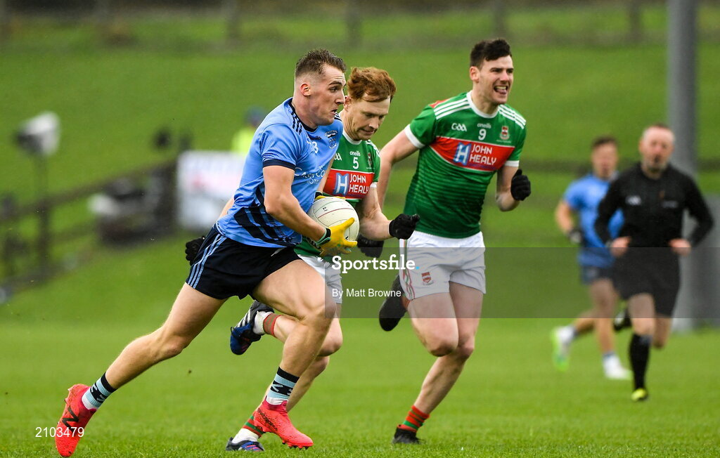 23 October 2021; Eoghan McLaughlin of Westport St Patrick's in action against Sean Regan of Ballina Stephenites during the Mayo County Senior Club Football Championship Quarter-Final match between Westport St Patrick's and Ballina Stephenites at Connacht GAA Centre in Bekan, Mayo. Photo by Matt Browne/Sportsfile