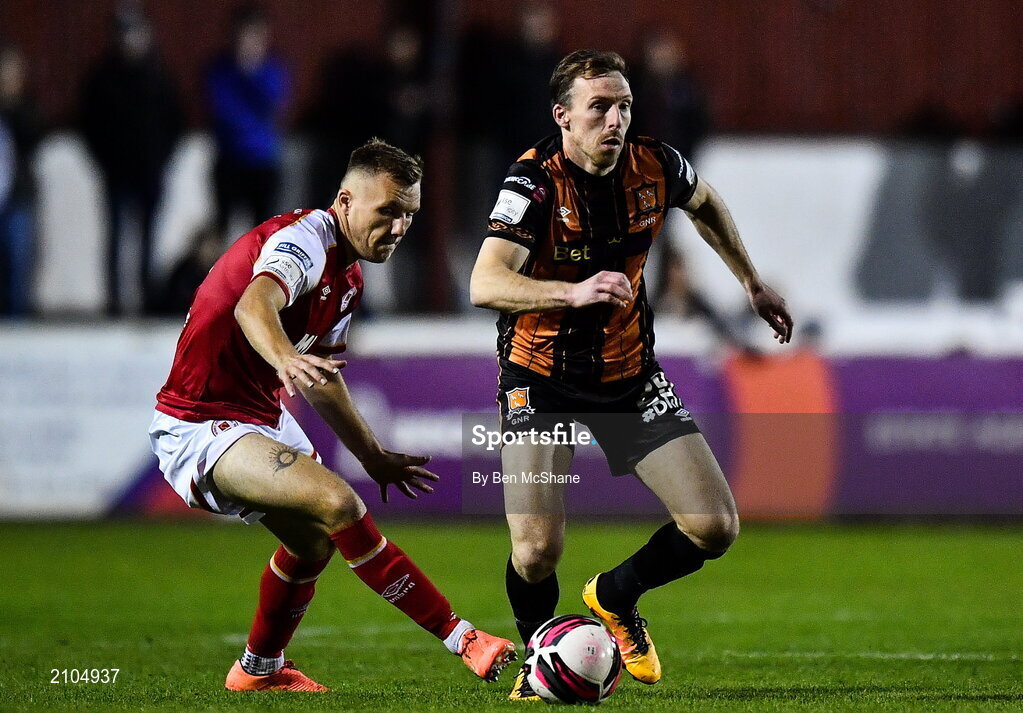 25 October 2021; David McMillan of Dundalk and Jamie Lennon of St Patrick's Athletic during the SSE Airtricity League Premier Division match between St Patrick's Athletic and Dundalk at Richmond Park in Dublin. Photo by Ben McShane/Sportsfile