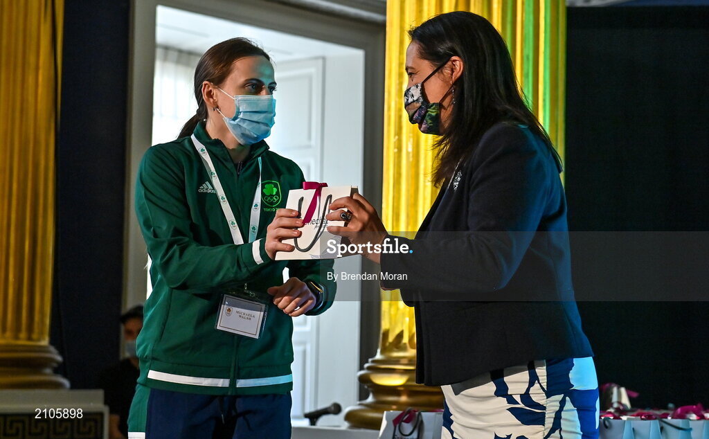 29 October 2021; The athletes and staff who represented Team Ireland at Tokyo 2020 this summer were formally congratulated at the Official Team Ireland Homecoming in Dublin Castle. A record number of Irish athletes competed at the Summer Olympics in Japan with 116 athletes competing across nineteen sports. An Taoiseach Michéal Martin TD, Minister Catherine Martin TD, Minister of State Jack Chambers TD and His Excellency Ambassador Extraordinary and Plenipotentiary of Japan to Ireland, Mr Mitsuru Kitano attended the event to honour the athletes. Making a presentation to Team Ireland athlete Michaela Walsh is Minister for Media, Tourism, Arts, Culture, Sport and the Gaeltacht, Catherine Martin T.D.  Photo by Brendan Moran/Sportsfile
