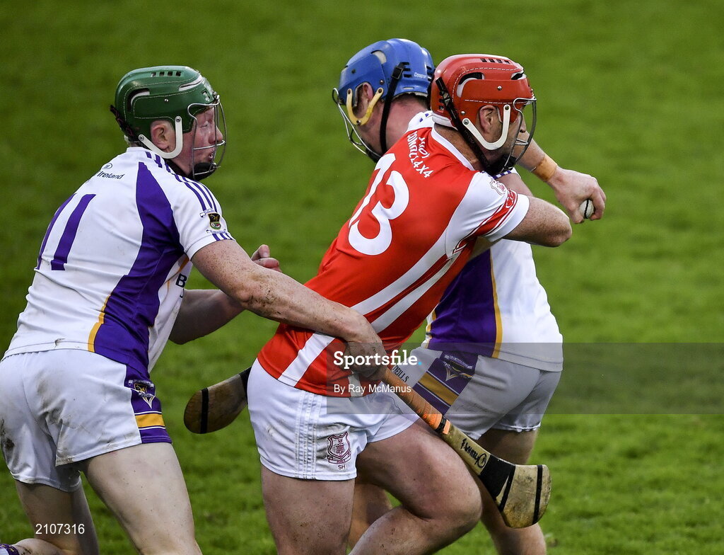 31 October 2021; David Treacy of Cuala is tackled by Fergal Whitely and Oisin O’Rorke of Kilmacud Crokes  during the Go Ahead Dublin County Senior Club Hurling Championship Semi-Final match between Cuala and Kilmacud Crokes at Parnell Park in Dublin. Photo by Ray McManus/Sportsfile