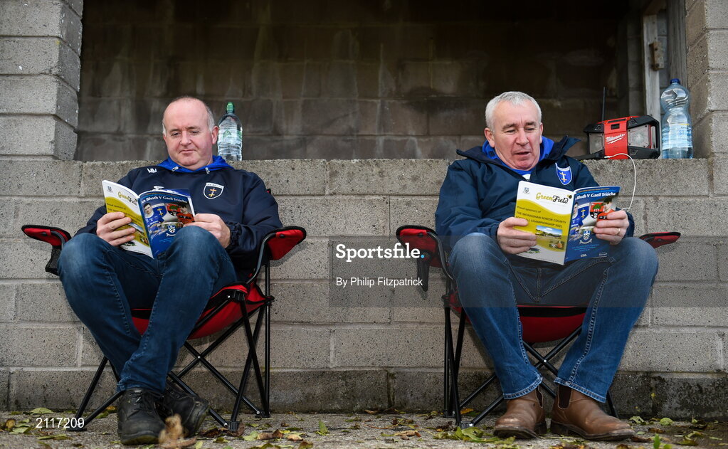 7 November 2021; Mark Mullan, left, and Aidan McCarra, from Scotstown, view the match prorgramme before the Monaghan County Senior Club Football Championship Final match between Scotstown and Truagh at St Tiernachs Park in Clones, Monaghan. Photo by Philip Fitzpatrick/Sportsfile