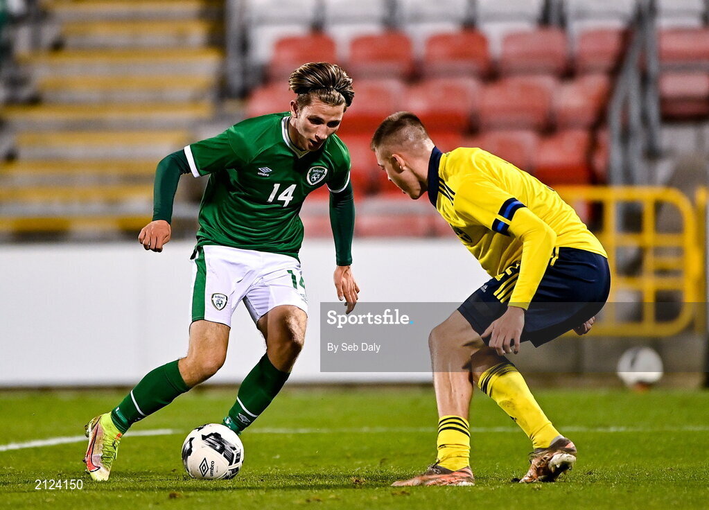 16 November 2021; Oliver O'Neill of Republic of Ireland in action against Emil Holm of Sweden during the UEFA European U21 Championship qualifying group A match between Republic of Ireland and Sweden at Tallaght Stadium in Dublin. Photo by Seb Daly/Sportsfile