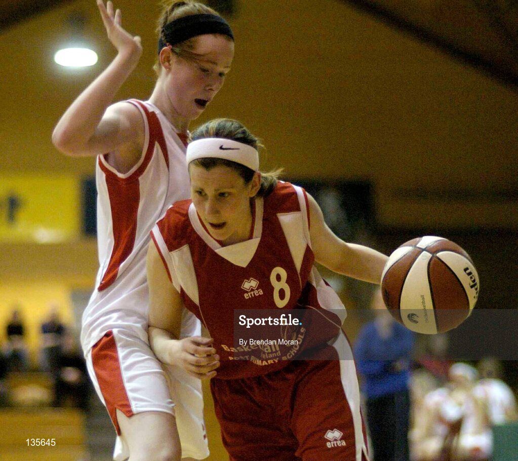 30 March 2004; Siobhan Griffin, Killarney, in action against Aisling Danagher, Salesians. All - Ireland Schoolgirls Basketball League, Senior 'C' Final, Salesians, Limerick, v Killarney Community College, Kerry, ESB Arena, Tallaght, Dublin. Picture credit; Brendan Moran / SPORTSFILE *EDI*