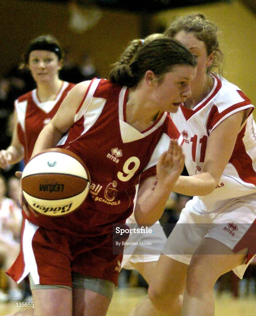 30 March 2004; Mary Walsh, Killarney, in action against Kate Enright, Salesians. All - Ireland Schoolgirls Basketball League, Senior 'C' Final, Salesians, Limerick, v Killarney Community College, Kerry, ESB Arena, Tallaght, Dublin. Picture credit; Brendan Moran / SPORTSFILE *EDI*