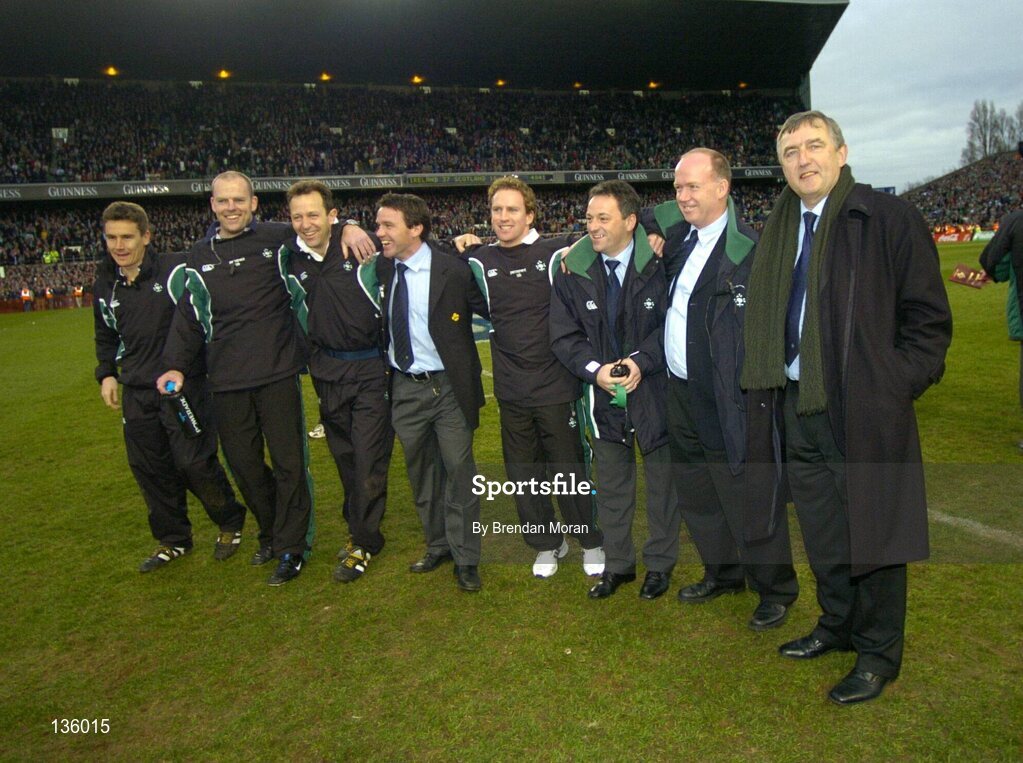 27 March 2004; The Ireland backroom team, from left, Dr Gary O'Driscoll, team doctor, Mervyn Murphy, video analyst, Ailbe McCormack, team physiotherapist, Mike Ford, defence coach, Mike McGurn, fitness coach, Mark Tainton, kicking coach, Declan Kidney, assistant coach and John Redmond, Media Liaison Officer, celebrate victory over Scotland. RBS Six Nations Rugby Championship 2003-2004, Ireland v Scotland, Lansdowne Road, Dublin. Picture credit; Brendan Moran / SPORTSFILE *EDI*