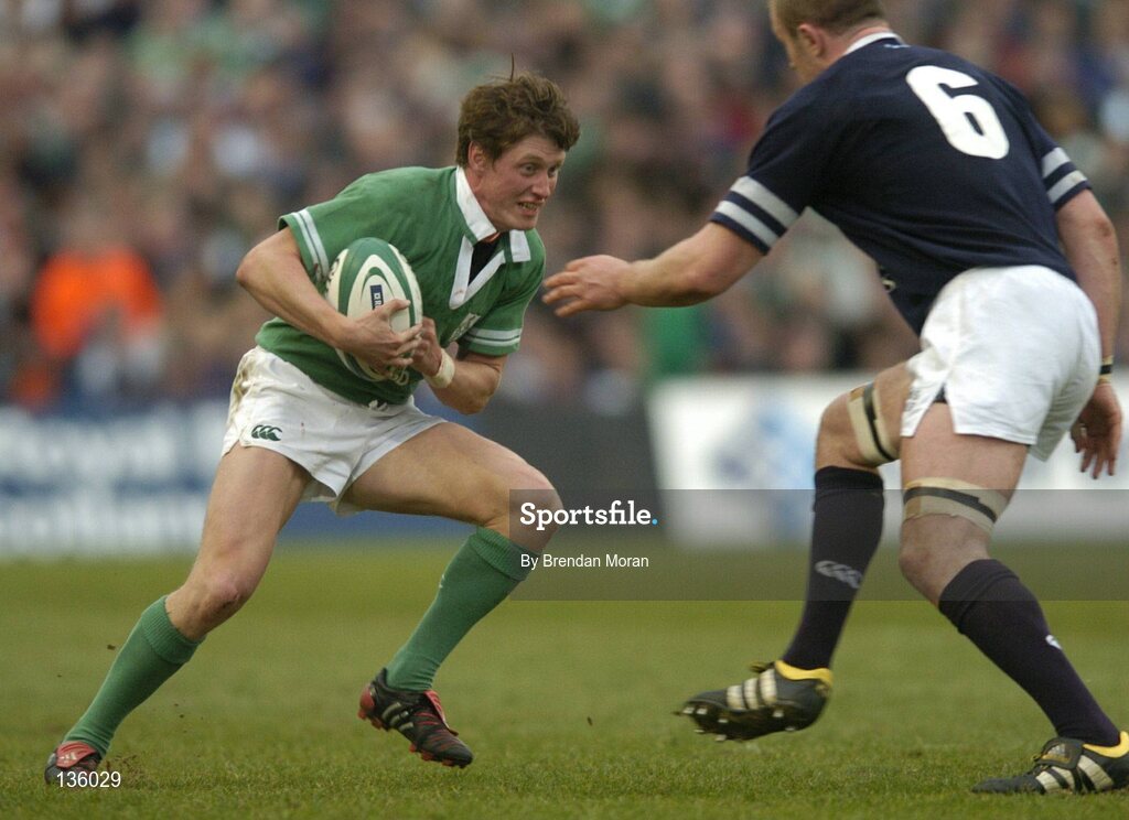 27 March 2004; Ronan O'Gara, Ireland, in action against Jason White, Scotland. RBS Six Nations Rugby Championship 2003-2004, Ireland v Scotland, Lansdowne Road, Dublin. Picture credit; Brendan Moran / SPORTSFILE *EDI*
