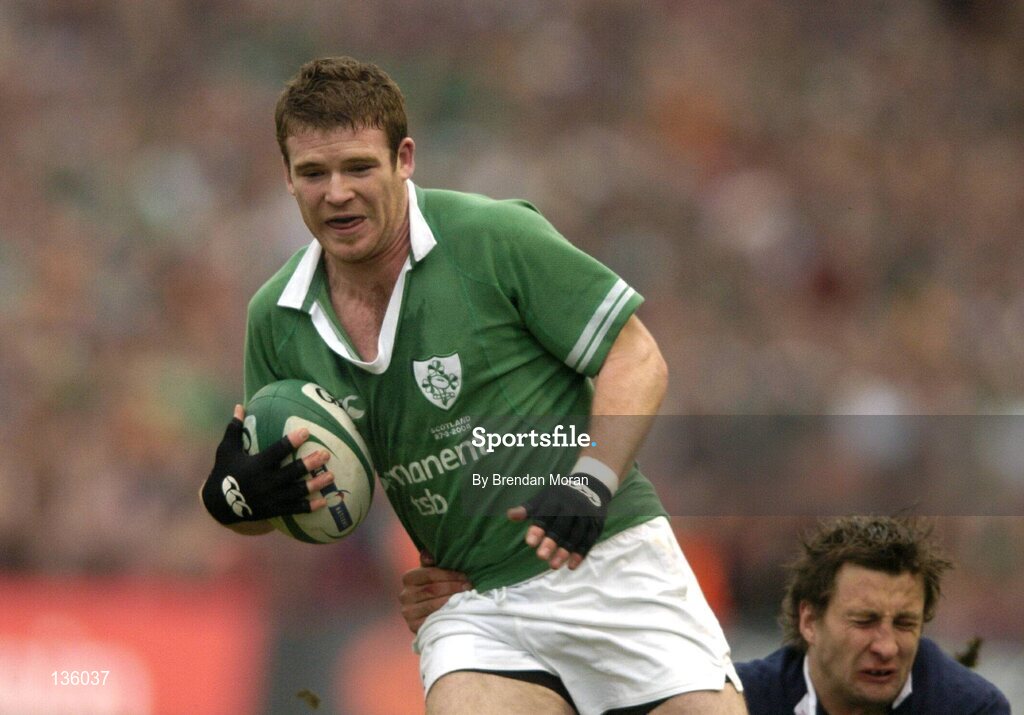 27 March 2004; Gordon D'Arcy, Ireland, in action against Scotland's Chris Cusiter. RBS Six Nations Rugby Championship 2003-2004, Ireland v Scotland, Lansdowne Road, Dublin. Picture credit; Brendan Moran / SPORTSFILE *EDI*