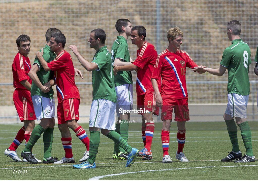 28 July 2013; Ireland and Russia players shake hands after the match. 2013 CPISRA Intercontinental Cup, Group B, Ireland v Russia, Stadium ZEM Jaume Tubau, Sant Cugat del Valles, Barcelona, Spain. Picture credit: Juan Manuel Baliellas / SPORTSFILE