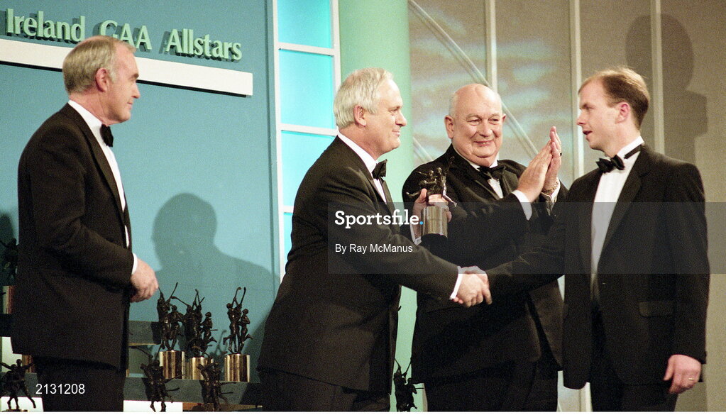 16 December 1994; Tyrone footballer Peter Canavan is presented with his Bank of Ireland All-Star Award by An Taoiseach John Bruton TD, in the company of Bank of Ireland CEO Pat Molloy, left, and Uachtarán Chumann Lúthchleas Gael Jack Boothman at the Bank of Ireland GAA All-Star Awards at the Burlington Hotel in Dublin. Photo by Ray McManus/Sportsfile