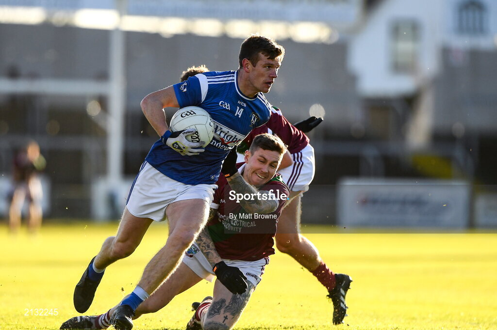 5 December 2021; John Heslin of St Loman's in action against Stuart Mulpeter and Adam Ryan of Portarlington during the AIB Leinster GAA Football Senior Club Championship Quarter-Final match between Portarlington and St Loman's at MW Hire O’Moore Park in Portlaoise, Laois. Photo by Matt Browne/Sportsfile