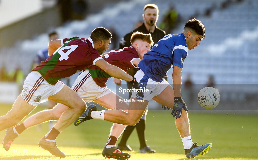 5 December 2021; TJ Cox of St Loman's in action against David Murphy and Rioghan Murphy of Portarlington during the AIB Leinster GAA Football Senior Club Championship Quarter-Final match between Portarlington and St Loman's at MW Hire O’Moore Park in Portlaoise, Laois. Photo by Matt Browne/Sportsfile