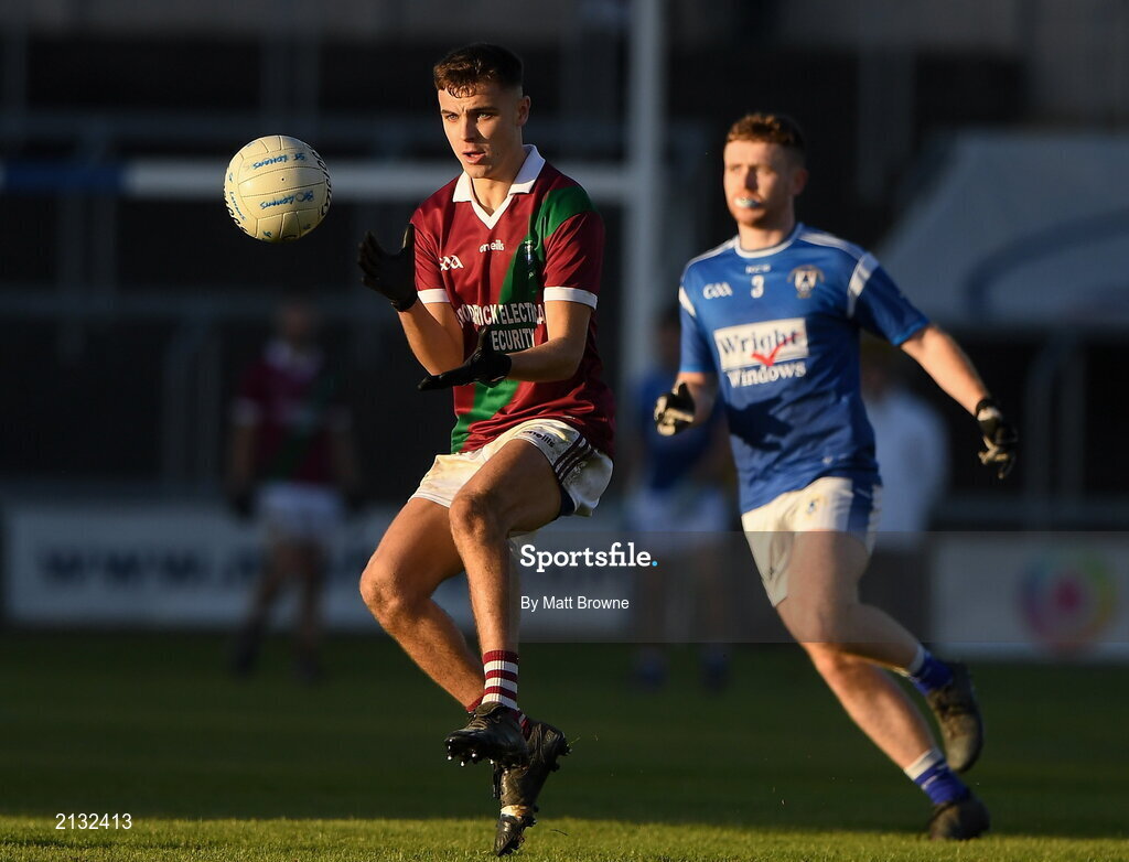 5 December 2021; Ronan Coffey of Portarlington in action against Oisin Hogan of St Loman's during the AIB Leinster GAA Football Senior Club Championship Quarter-Final match between Portarlington and St Loman's at MW Hire O’Moore Park in Portlaoise, Laois. Photo by Matt Browne/Sportsfile