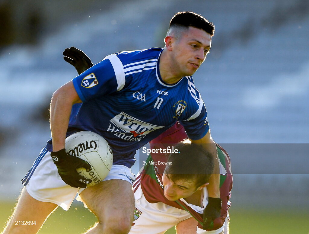 5 December 2021; Ronan O'Toole of St Loman's in action against Alex Mohan of Portarlington during the AIB Leinster GAA Football Senior Club Championship Quarter-Final match between Portarlington and St Loman's at MW Hire O’Moore Park in Portlaoise, Laois. Photo by Matt Browne/Sportsfile