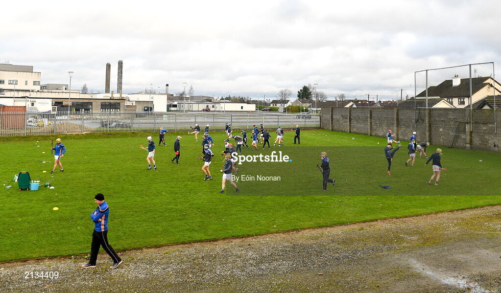 12 December 2021; St Rynaghs players warm up at the back of the stand before the AIB Leinster GAA Hurling Senior Club Championship Semi-Final match between St Rynaghs and Shamrocks Ballyhale at Bord na Mona O’Connor Park in Tullamore, Offaly. Photo by Eóin Noonan/Sportsfile