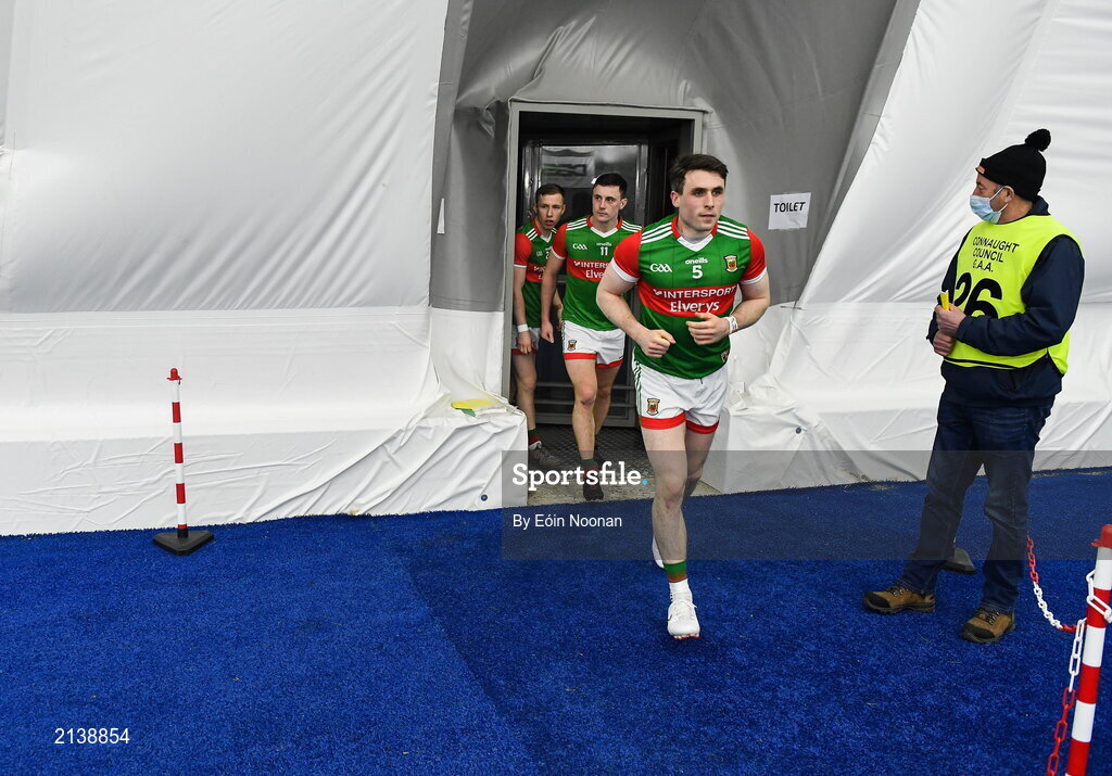 7 January 2022; Paddy Durcan of Mayo leads his team-mates back into the dome after half-time during the Connacht FBD League semi-final match between Mayo and Galway at the NUI Galway Connacht GAA Air Dome in Bekan, Mayo. Photo by Eóin Noonan/Sportsfile