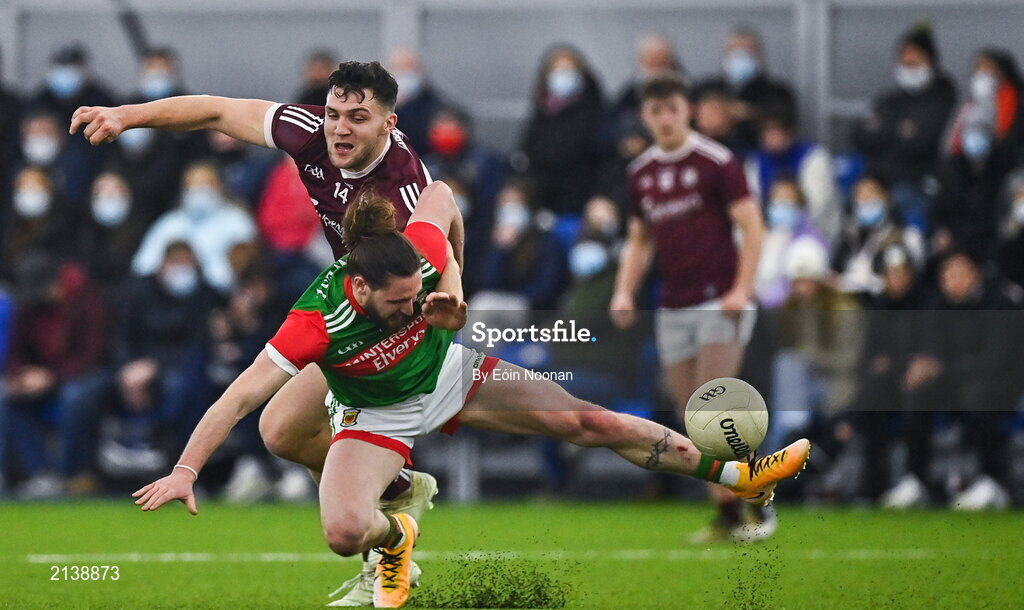 7 January 2022; Padraig O’Hora of Mayo is tackled by Damien Comer of Galway during the Connacht FBD League semi-final match between Mayo and Galway at the NUI Galway Connacht GAA Air Dome in Bekan, Mayo. Photo by Eóin Noonan/Sportsfile