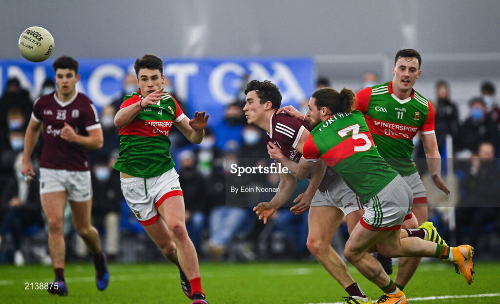 7 January 2022; Finnian Ó Laoí of Galway is tackled by Padraig O’Hora of Mayo during the Connacht FBD League semi-final match between Mayo and Galway at the NUI Galway Connacht GAA Air Dome in Bekan, Mayo. Photo by Eóin Noonan/Sportsfile