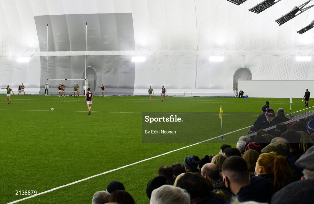 7 January 2022; Spectators watch on as Matthew Tierney of Galway prepares to take a free during the Connacht FBD League semi-final match between Mayo and Galway at the NUI Galway Connacht GAA Air Dome in Bekan, Mayo. Photo by Eóin Noonan/Sportsfile