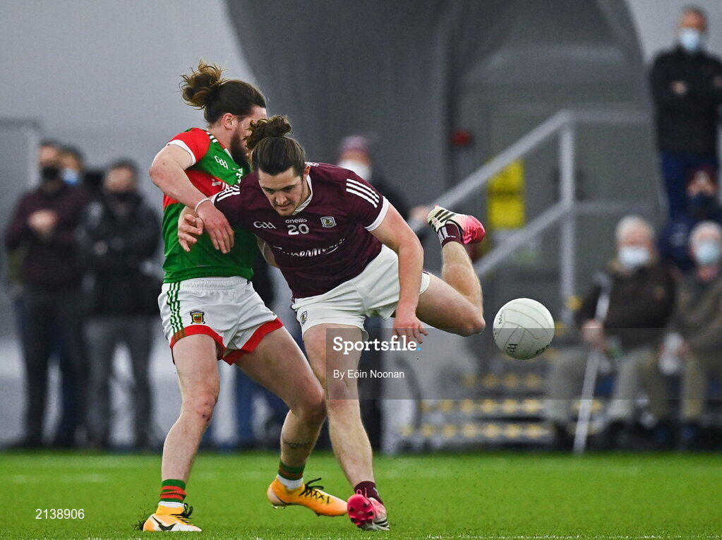 7 January 2022; Kieran Molloy of Galway in action against Padraig O’Hora of Mayo during the Connacht FBD League semi-final match between Mayo and Galway at the NUI Galway Connacht GAA Air Dome in Bekan, Mayo. Photo by Eóin Noonan/Sportsfile