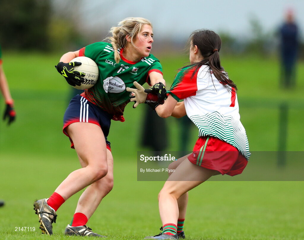 23 January 2022; Michaela Kenneally of Mullinahone in action against Laura Farrell of St Brendan's during the 2021 currentaccount.ie All-Ireland Ladies Junior Club Football Championship Semi-Final match between Mullinahone, Tipperary and St Brendan's, Galway at John Lockes GAA Club in Callan, Kilkenny. Photo by Michael P Ryan/Sportsfile