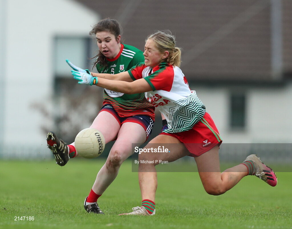23 January 2022; Molly Walsh of Mullinahone in action against Linda Booth of St Brendan's during the 2021 currentaccount.ie All-Ireland Ladies Junior Club Football Championship Semi-Final match between Mullinahone, Tipperary and St Brendan's, Galway at John Lockes GAA Club in Callan, Kilkenny. Photo by Michael P Ryan/Sportsfile
