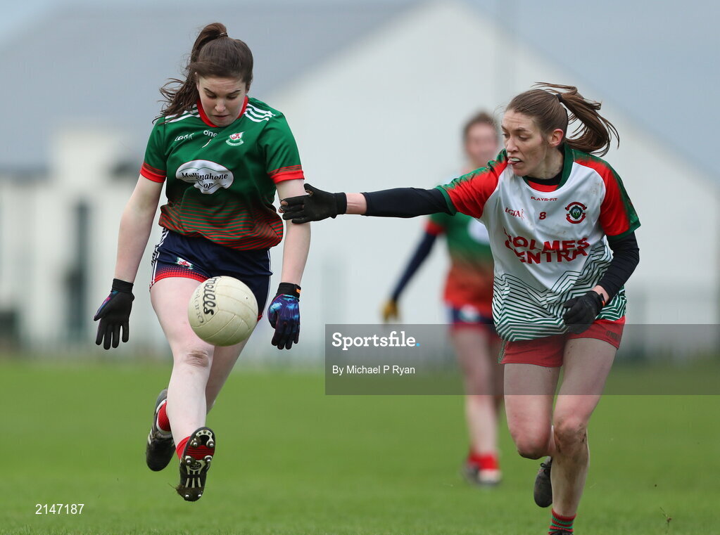 23 January 2022; Emma Cody of Mullinahone in action against Ellen Muldoon of St Brendan's during the 2021 currentaccount.ie All-Ireland Ladies Junior Club Football Championship Semi-Final match between Mullinahone, Tipperary and St Brendan's, Galway at John Lockes GAA Club in Callan, Kilkenny. Photo by Michael P Ryan/Sportsfile