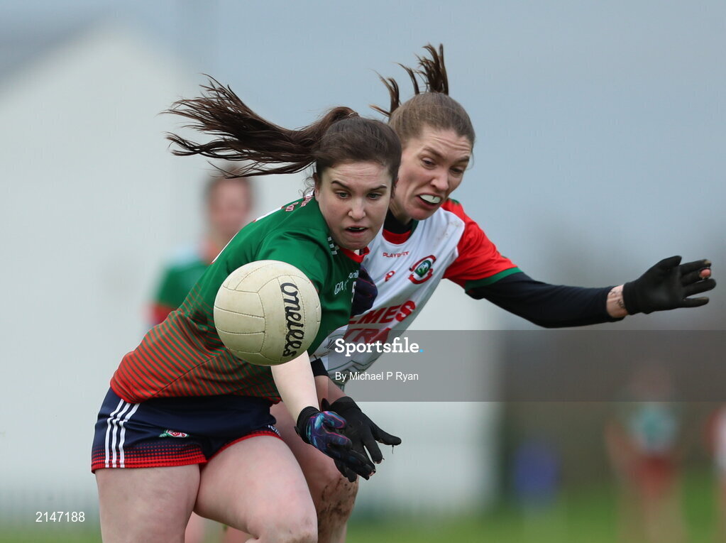 23 January 2022; Emma Cody of Mullinahone in action against Ellen Muldoon of St Brendan's during the 2021 currentaccount.ie All-Ireland Ladies Junior Club Football Championship Semi-Final match between Mullinahone, Tipperary and St Brendan's, Galway at John Lockes GAA Club in Callan, Kilkenny. Photo by Michael P Ryan/Sportsfile